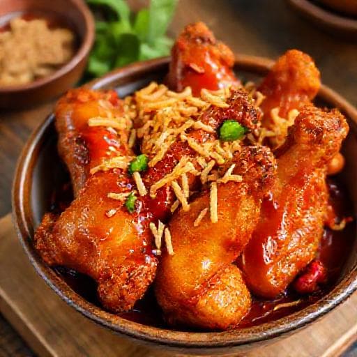 Spicy Tamarind Chicken Wings with Crispy Shallots