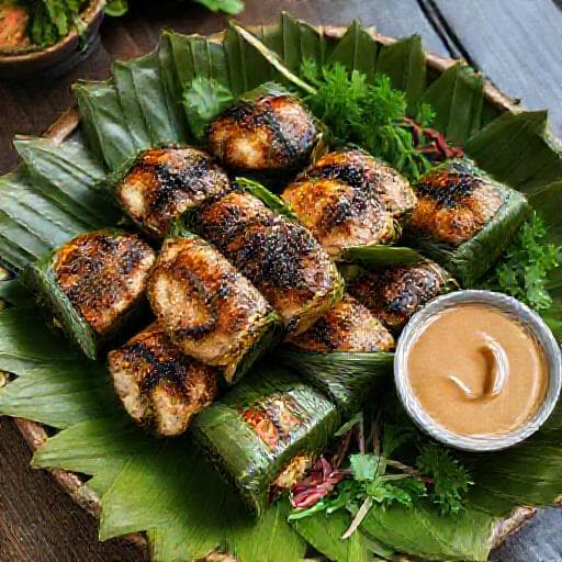 Chả Cá Thác Lác Cuốn Lá Lốt (Grilled Fish Cakes Wrapped in Betel Leaves)