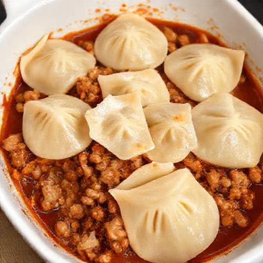 Snelle Varkensvlees Dumpling Ovenschotel