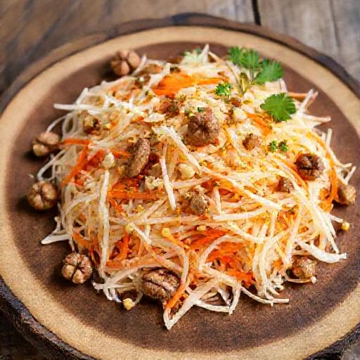 Салата от ряпа и моркови с орехи и мед