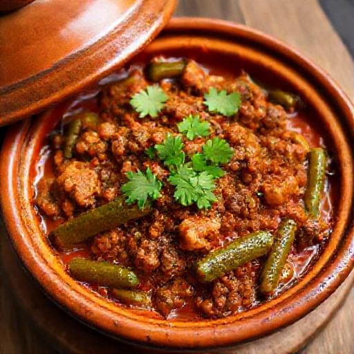 طاجن بامية باللحم المفروم والكزبرة