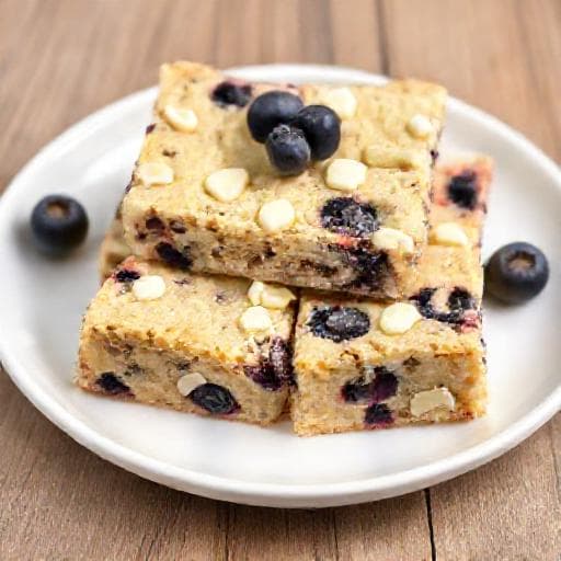 Blondies Rápidos de Chocolate Blanco y Arándanos