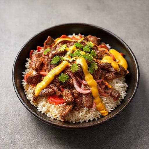 Lomo Saltado with Quinoa and Aji Amarillo Crema