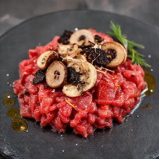 Carne Cruda all'Albese con Funghi Porcini e Tartufo