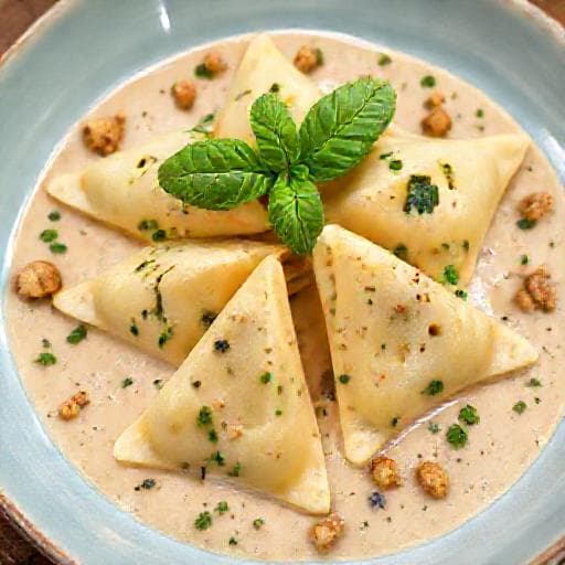 Pansoti con Salsa di Noci e Erbe Aromatiche