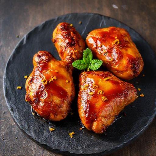 Kyllingklubber med Harissa og Appelsinglasur