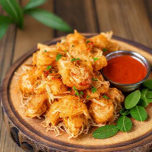ทอดมันหัวปลีใส่กุ้งและสมุนไพร
